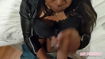 African beauty gives a deepthroat blowjob to a big cock