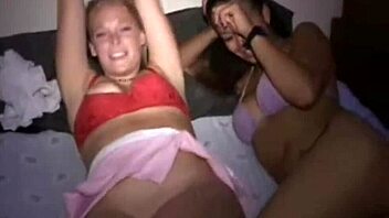 amateur teen lesbians finger each other's pussies at a university party