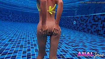 skinny asian babe swimming with a huge butt plug, damn hot! 🍑