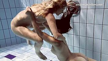 Hey, Iva Brizgina and Paulinka, hot lesbian action by the pool!