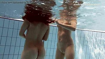 Hey, Iva Brizgina and Paulinka, hot lesbian action by the pool!