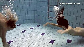 Hey, Iva Brizgina and Paulinka, hot lesbian action by the pool!