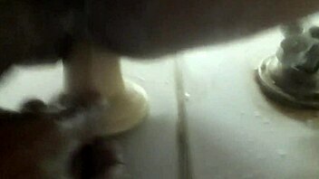 I was masturbating with my dildo in the shower, feeling the water run over me