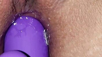 Amateur woman with big tits and boobs engages in homemade anal masturbation, fingering her ass while pleasuring her pussy