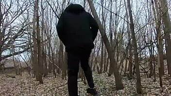 Look at her sucking cock topless in the park!