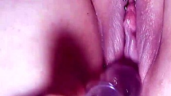 Does step-sister's pussy squirt with glass dildo?