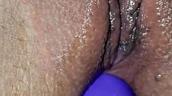 Amateur woman with big tits and boobs engages in homemade anal masturbation, fingering her ass while pleasuring her pussy