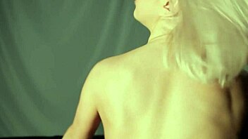 bright eyed mandy dee strips teasingly on couch