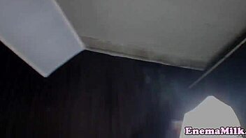 Beautiful lesbian scene with milk enema and toy play