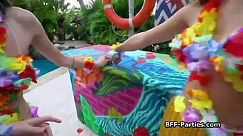 Four people enjoying hardcore sex in a Hawaiian setting