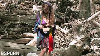 Sexy natural 18 yo girl masturbates her hairy pussy in the forest.