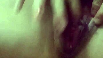 Young girl masturbates with toys on her pussy.