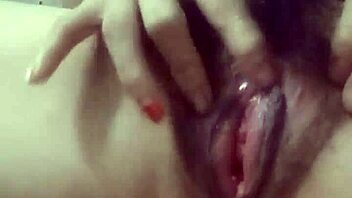 Young girl masturbates with toys on her pussy.