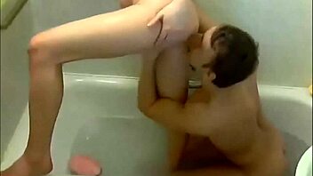 Oral sex in the bathroom unfolds with webcam couple licking, sucking, and deepthroating each other's genitals.