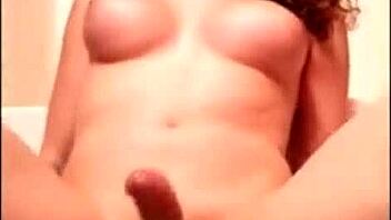 very attractive trans woman rides a dildo and masturbates