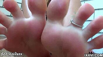 teen babe gives footjob and handjob with huge dildo