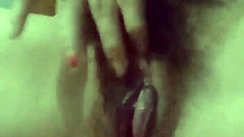 Young girl masturbates with toys on her pussy.