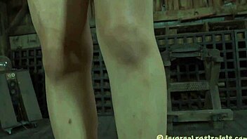 in this rough bondage scene, the sexy slave gets her jugs clamped hard while tied up