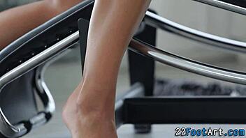 pretty slut gives footjob to cumshot.