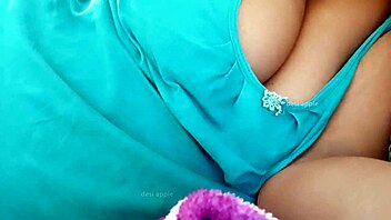 Indian bhabhi flaunts her sexy boobs in steamy scene