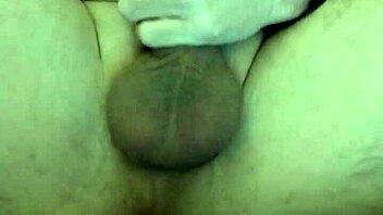 pushing in the big black plug close up