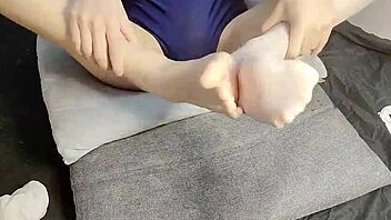 Slim gay teen 18+ indulges in foot fetish with beautiful Chinese twink