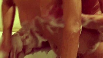 Soapy massage turns sensual with an exotic oriental masseuse in an oiled-up session.