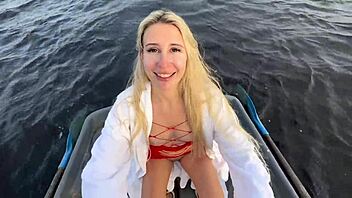 Amateur couple enjoys funny outdoor boat sex on the lake