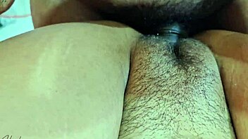 Homemade video of Asian milf slut fucked missionary in dorm by Colombian stud