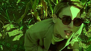 a guy helps his friend in the cornfield