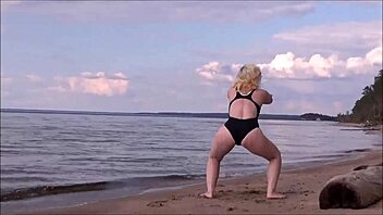 beautiful blonde works out with big tits and ass in the bath