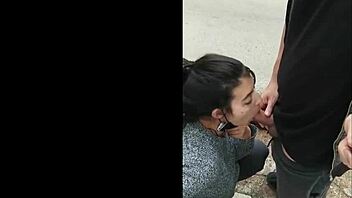 Risky public blowjob on the street, flashing tits for voyeurs.