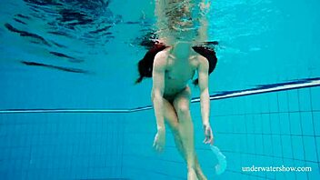 Nina Mohnatka Reveals Hairy Pussy in Bold Underwater Display