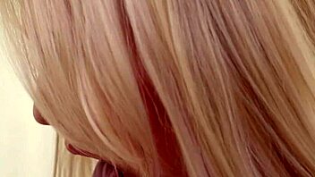 Two blonde teens finger each other.