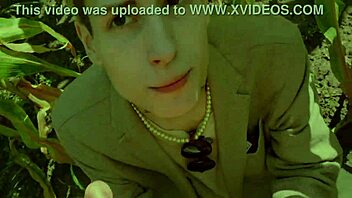 a guy helps his friend in the cornfield