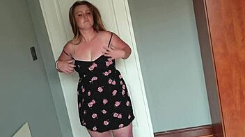 fat girl playing dress up by trying on different dresses