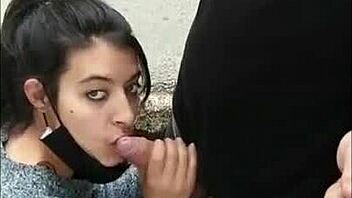 Risky public blowjob on the street, flashing tits for voyeurs.