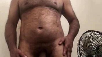 Big dick gay masturbation scene with cum dripping from the tip