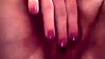 she massages her wet pussy deeply