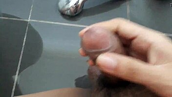 I am a gay Vietnamese guy jerking off in the bathroom until I cum hard from masturbation