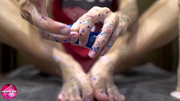 wow, watch this babe give a sensual footjob to a rubber cock in this foot fetish scene!