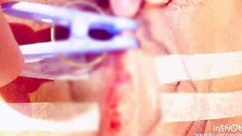 sucking and pinching the clitoris