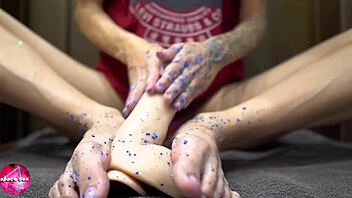 wow, watch this babe give a sensual footjob to a rubber cock in this foot fetish scene!