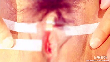 sucking and pinching the clitoris