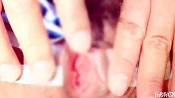 sucking and pinching the clitoris