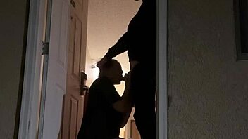 Amateur couple’s steamy encounter in a hotel doorway