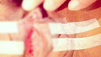 sucking and pinching the clitoris