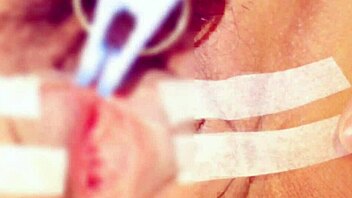 sucking and pinching the clitoris