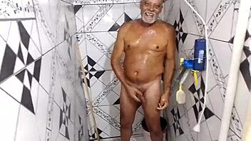 gugu da sunga dancing in the bathroom with hard cock