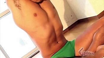 Gay Asian bodybuilder shows off his muscles